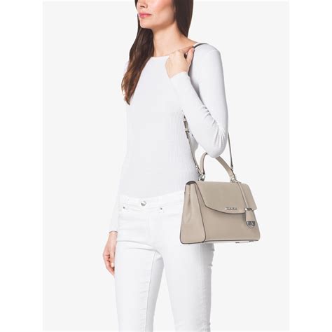 michael kors selma medium cement|More.